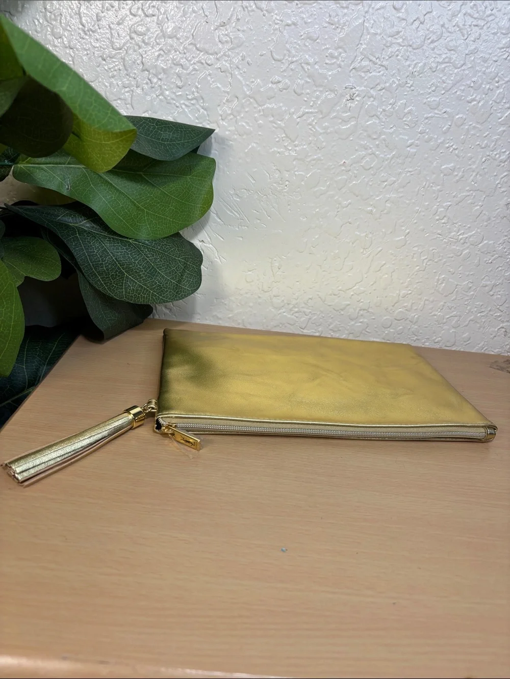 Yves Saint Laurent Metallic Gold Tassel Zip Pouch